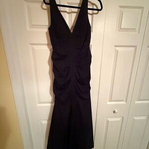 Xscape Black V-Neck Maxi Dress size will work for a 10/12. Stunning dress!